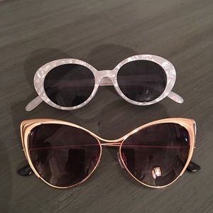 Two pairs stylish eyeglasses.